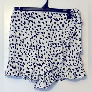 She+sky brand- white and black animal print skort.